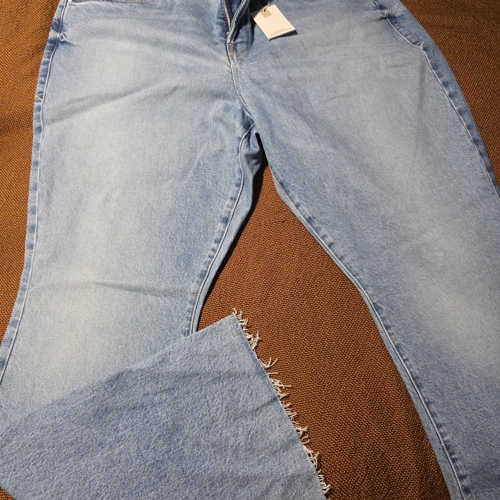 Good American Light Wash Wide-Leg Jeans with Frayed Hem